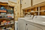 Laundry room with plenty of board games